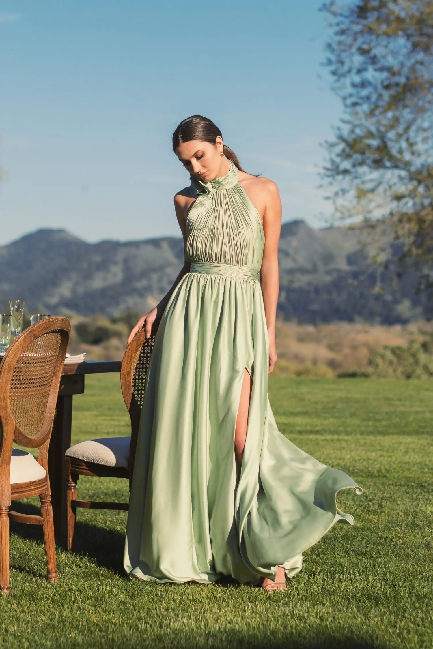 Green Halter Neck Open Back Satin Gown With Slit