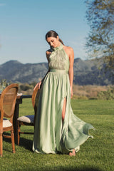 Green Halter Neck Open Back Satin Gown With Slit