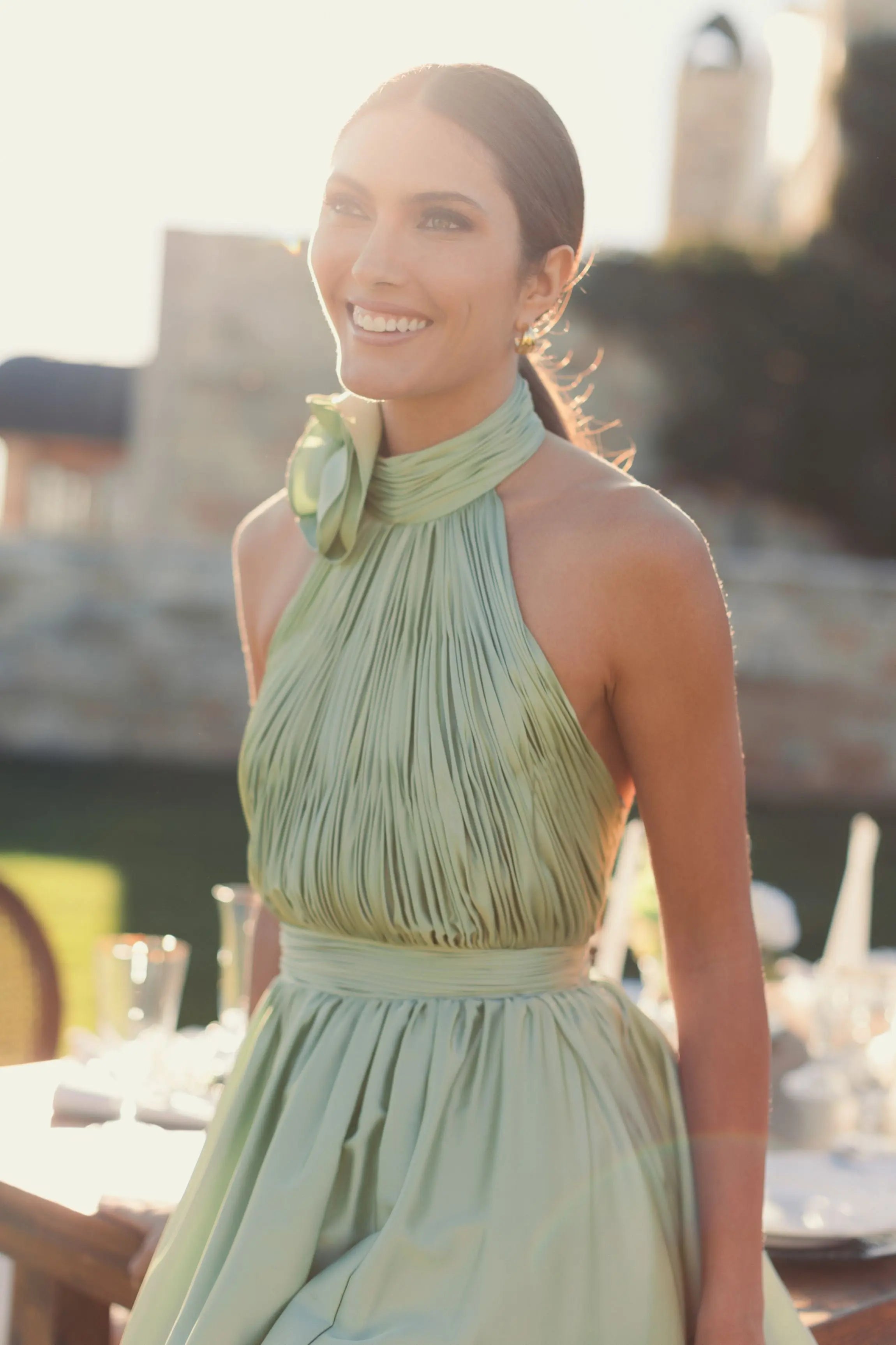 Green Halter Neck Open Back Satin Gown With Slit