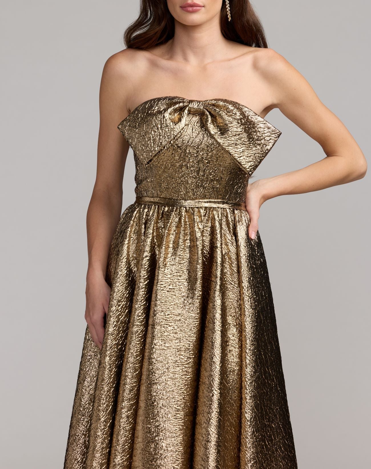 Gold Strapless Metallic Gown With Bow Detail