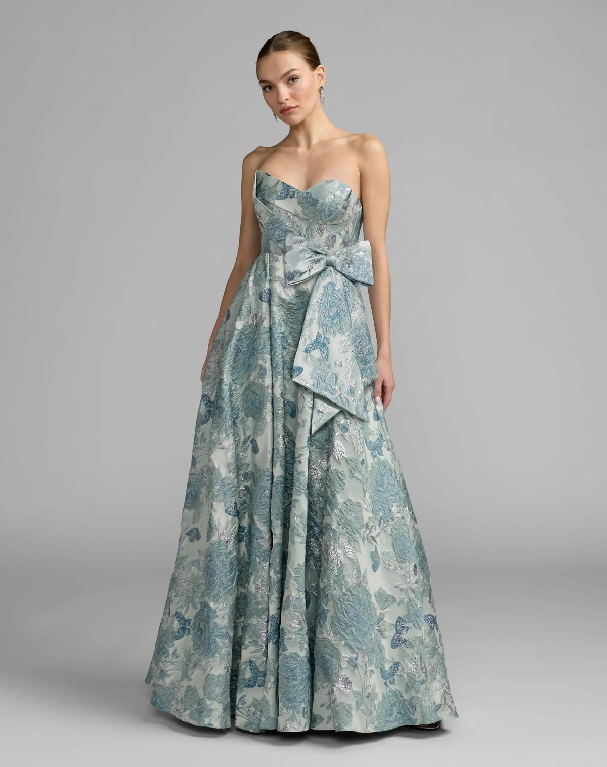 Blue Strapless Floral Brocade Ball Gown With Bow Detail